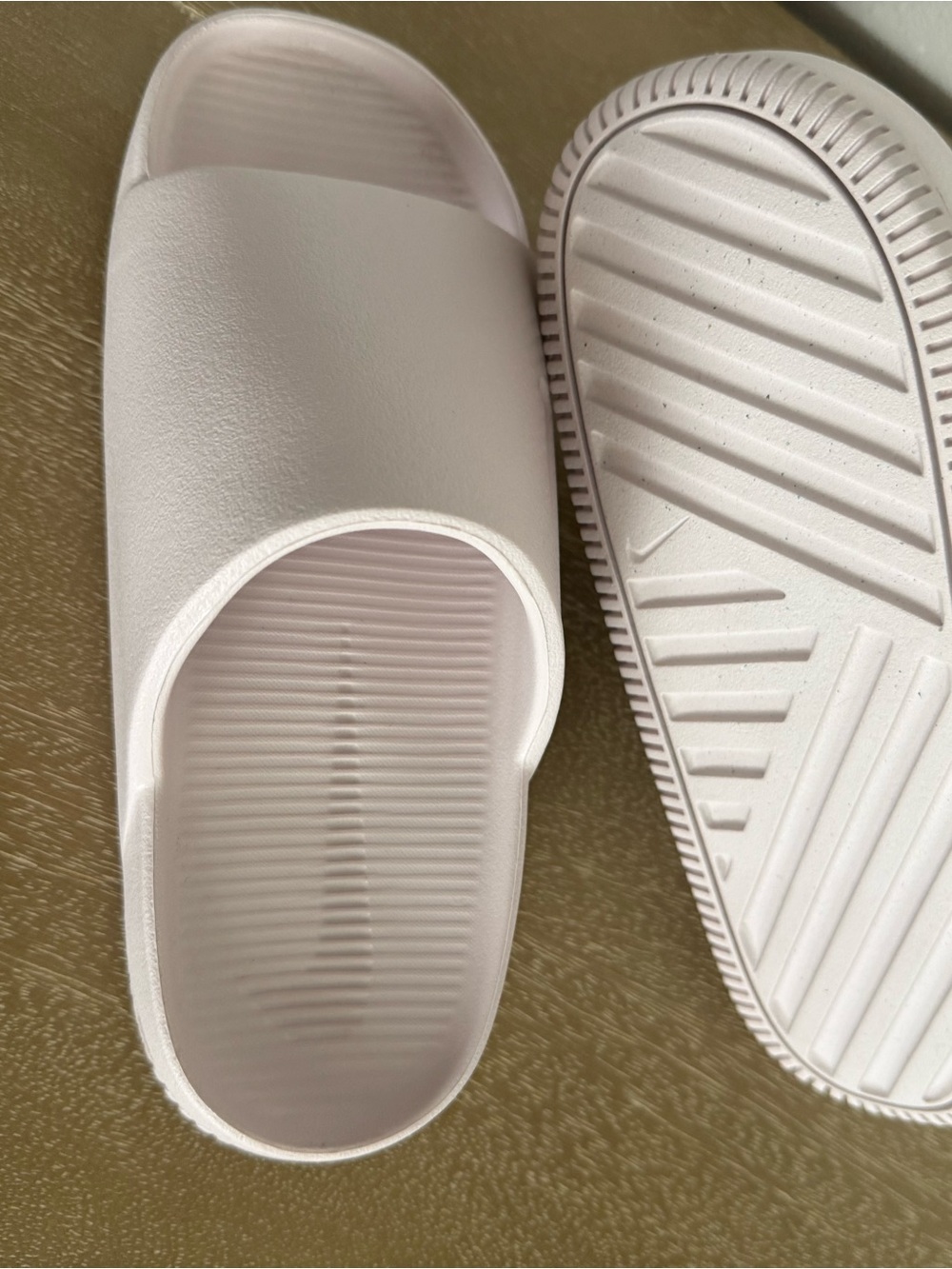 Nike Women's Slide Sandals in Pale Pink